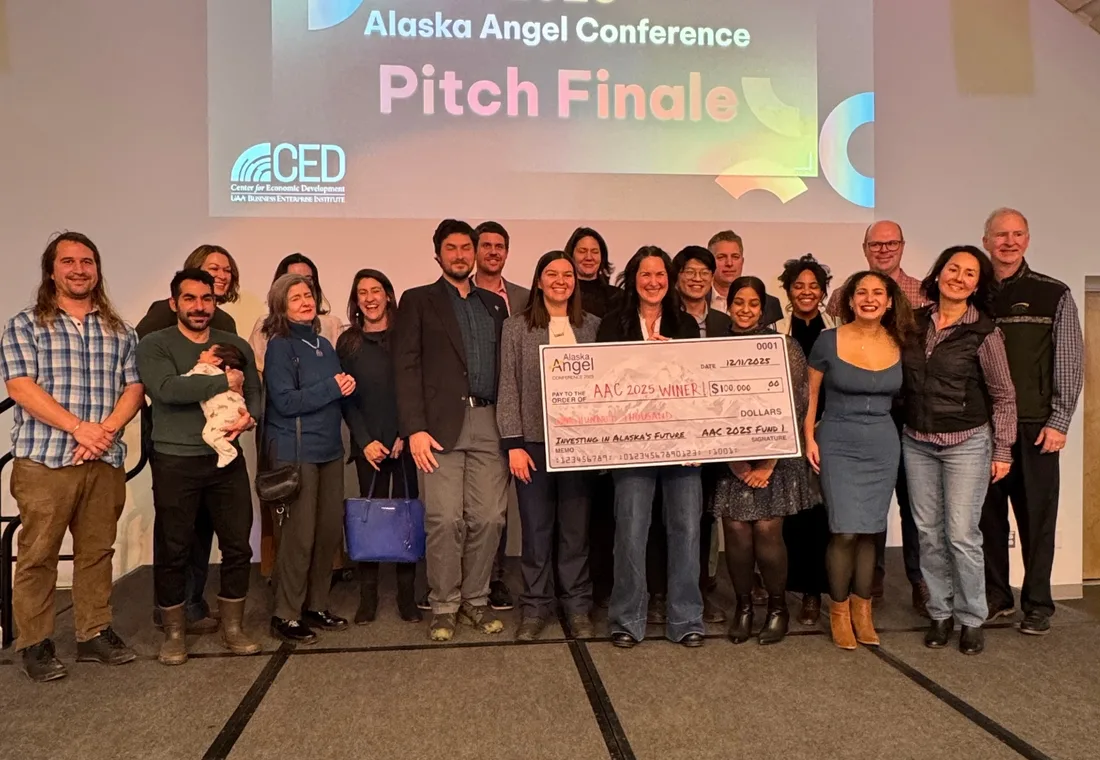 The 2025 Alaska Angel Conference cohort on stage with the winning startup